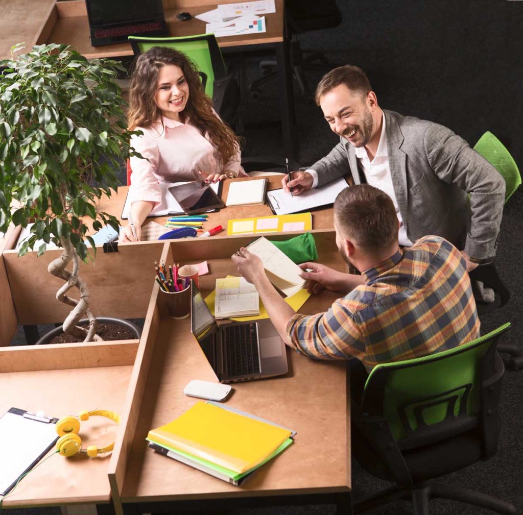 Group of business people using computer devices